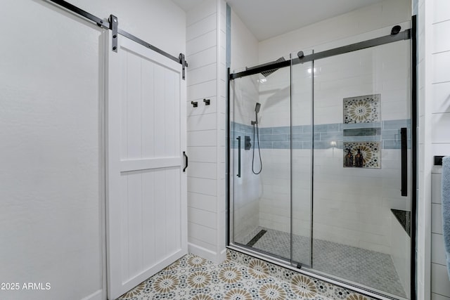 bathroom with a shower stall