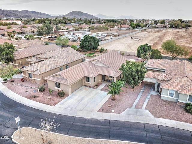 aerial view with a mountain view and a residential view