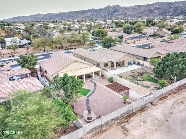 aerial view with a mountain view and a residential view