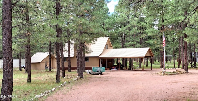 702 Mule Springs Trl, Forest Lakes, AZ 85931 - surrounding community featuring an attached carport and driveway
