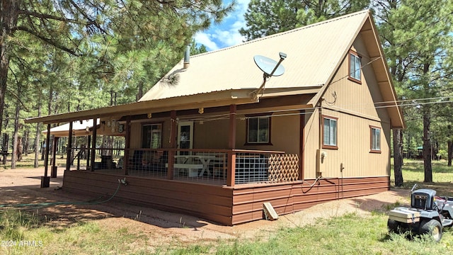 702 Mule Springs Trl, Forest Lakes, AZ 85931 - back of property with metal roof