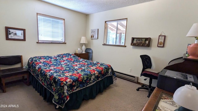 702 Mule Springs Trl, Forest Lakes, AZ 85931 - carpeted bedroom with a baseboard heating unit and a textured ceiling