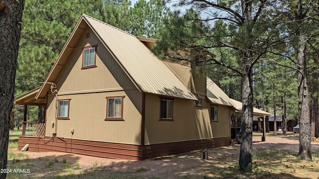 702 Mule Springs Trl, Forest Lakes, AZ 85931 - view of side of property featuring metal roof