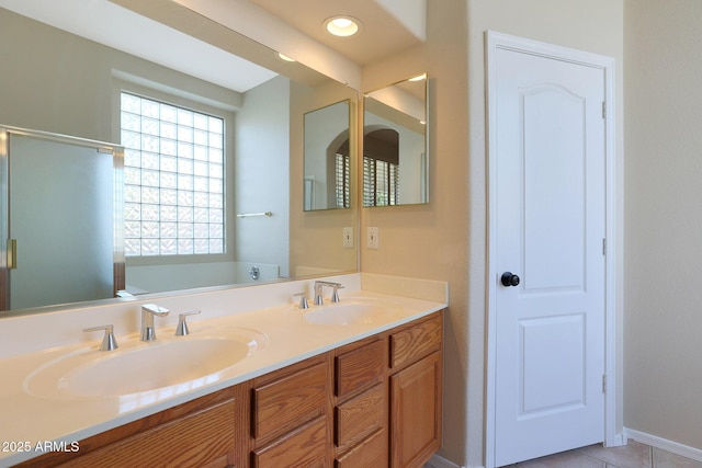 bathroom with vanity and tile patterned floors