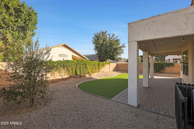 view of yard with a patio area