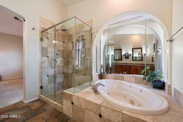 1922 E Everett Dr, Phoenix, AZ 85022 - bathroom featuring a tub with jets, a shower stall, and vanity