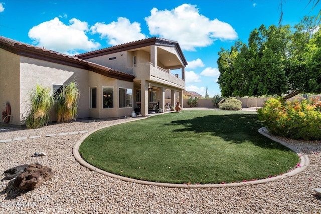 1922 E Everett Dr, Phoenix, AZ 85022 - rear view of house with a balcony, stucco siding, a tiled roof, and a patio area