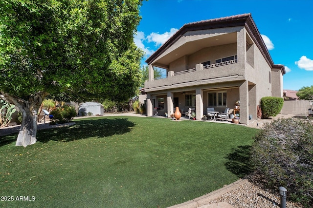 1922 E Everett Dr, Phoenix, AZ 85022 - rear view of house featuring a balcony, stucco siding, a patio, and a tiled roof
