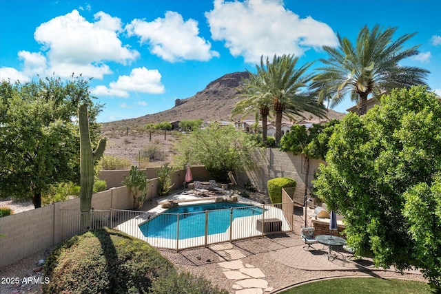 1922 E Everett Dr, Phoenix, AZ 85022 - view of swimming pool with a fenced backyard, a mountain view, and a patio area