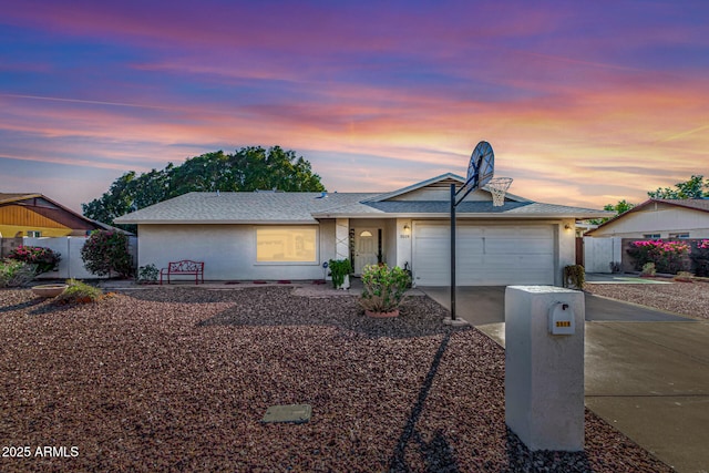 single story home with a garage