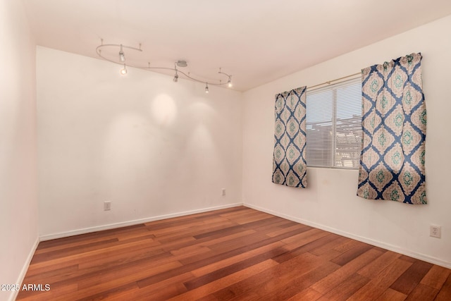 empty room featuring hardwood / wood-style floors