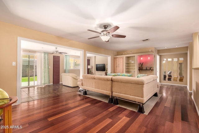 living room featuring dark hardwood / wood-style flooring