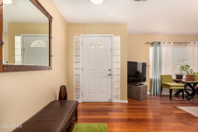 entrance foyer featuring hardwood / wood-style flooring