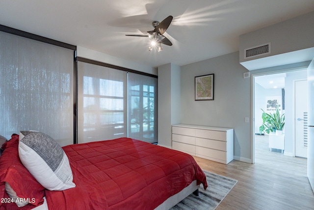 bedroom featuring ceiling fan and wood-type flooring