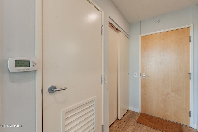 corridor featuring light wood-type flooring