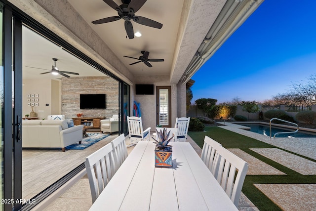 view of patio with outdoor dining area, a fenced backyard, an outdoor hangout area, and a fenced in pool