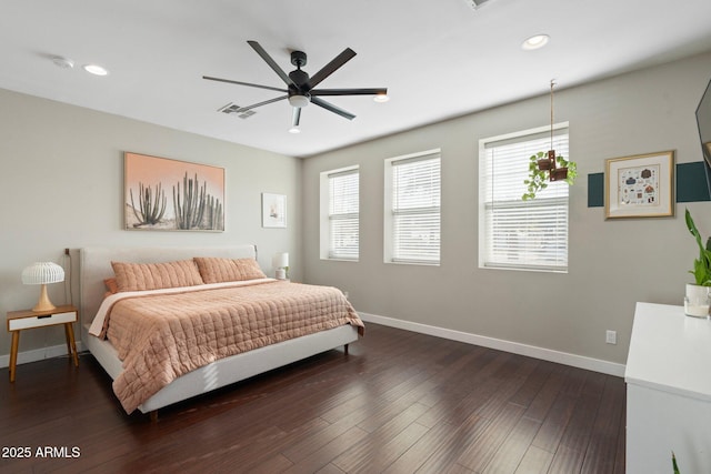 bedroom with recessed lighting, dark wood-style flooring, visible vents, and baseboards