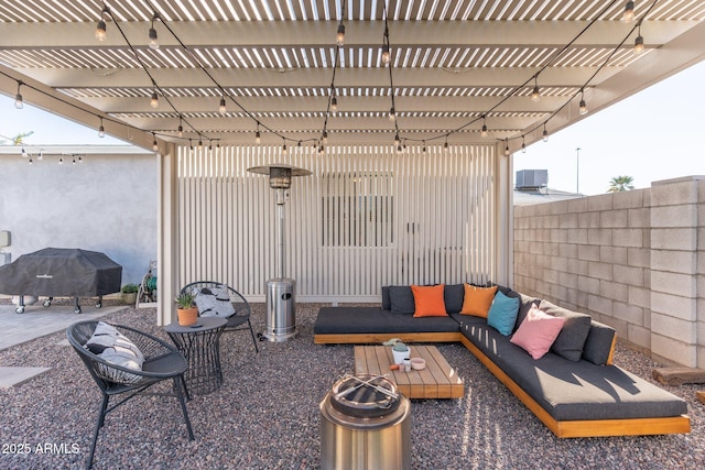 view of patio / terrace with outdoor lounge area, fence, and a pergola