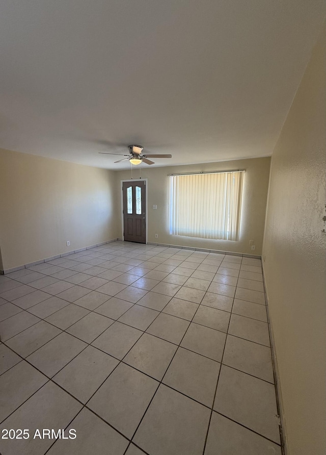 4913 W Maryland Ave, Glendale, AZ 85301 - unfurnished room featuring light tile patterned floors and ceiling fan