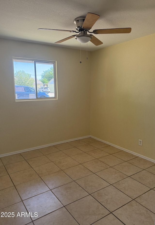 4913 W Maryland Ave, Glendale, AZ 85301 - unfurnished room featuring a ceiling fan, light tile patterned flooring, and a textured ceiling
