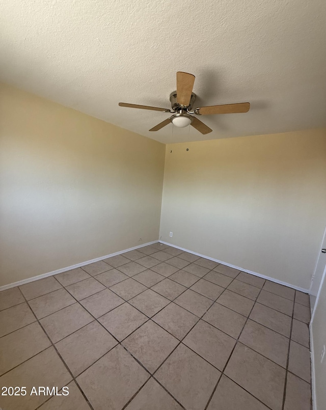 4913 W Maryland Ave, Glendale, AZ 85301 - empty room with light tile patterned floors, ceiling fan, and a textured ceiling