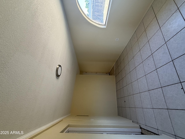 4913 W Maryland Ave, Glendale, AZ 85301 - staircase with tile walls