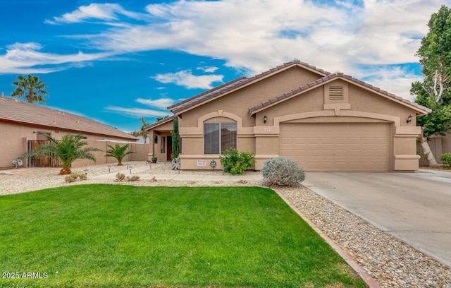 7457 W Crystal Rd, Glendale, AZ 85308 - view of front of house featuring concrete driveway, an attached garage, a front yard, and stucco siding