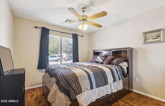 7457 W Crystal Rd, Glendale, AZ 85308 - bedroom featuring baseboards, visible vents, a ceiling fan, and wood finished floors