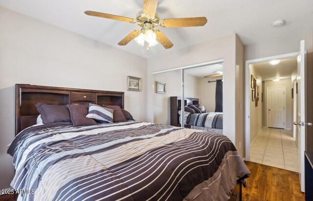 7457 W Crystal Rd, Glendale, AZ 85308 - bedroom with a closet, a ceiling fan, and wood finished floors