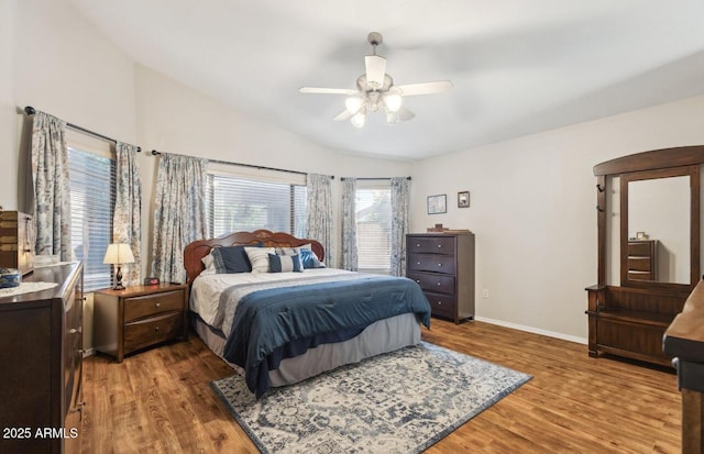 7457 W Crystal Rd, Glendale, AZ 85308 - bedroom featuring baseboards, vaulted ceiling, a ceiling fan, and wood finished floors