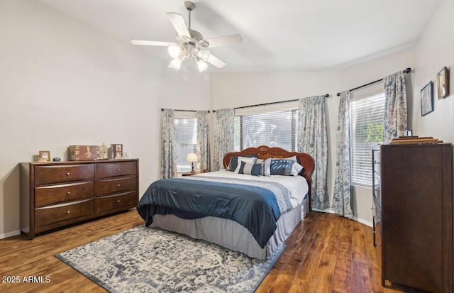 7457 W Crystal Rd, Glendale, AZ 85308 - bedroom with a ceiling fan, wood finished floors, baseboards, and lofted ceiling