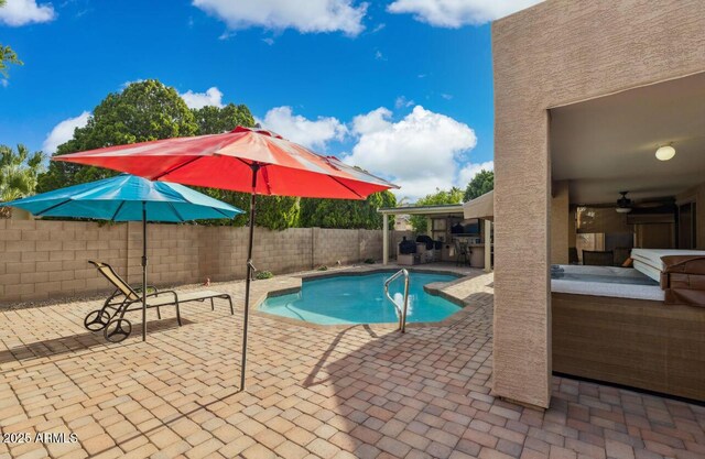 7457 W Crystal Rd, Glendale, AZ 85308 - view of swimming pool with a ceiling fan, a patio, a fenced in pool, and a fenced backyard