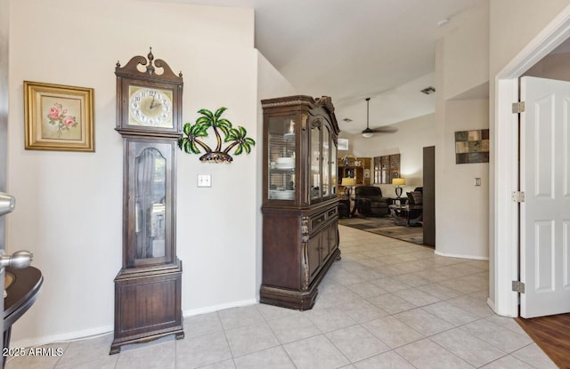 7457 W Crystal Rd, Glendale, AZ 85308 - hallway with lofted ceiling, baseboards, light tile patterned floors, and visible vents
