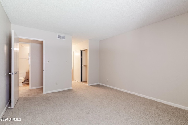 interior space featuring a textured ceiling