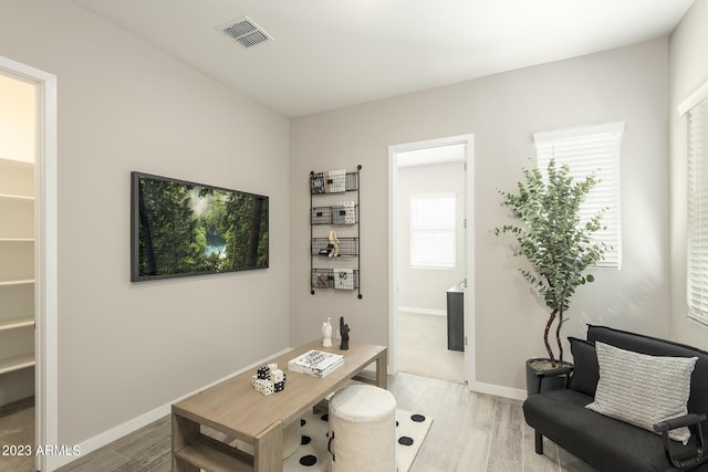 home office featuring light hardwood / wood-style floors