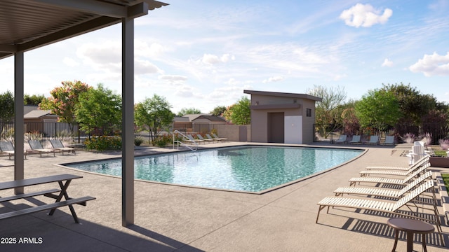 view of swimming pool with a patio area