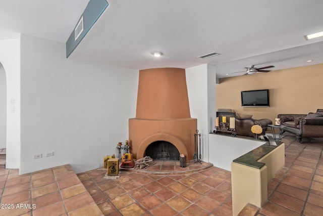 9012 S 47th Pl, Phoenix, AZ 85044 - living area featuring recessed lighting, visible vents, arched walkways, a large fireplace, and ceiling fan