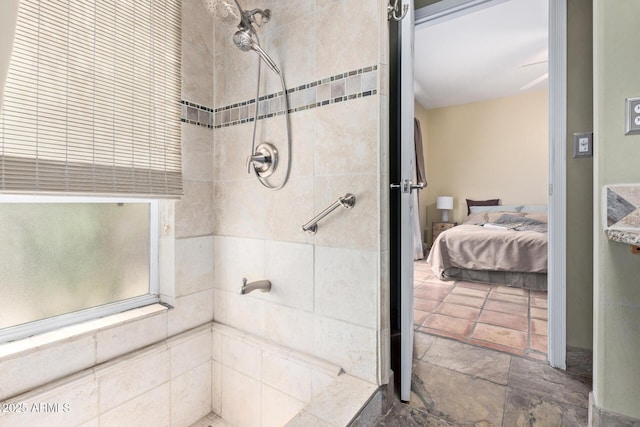 9012 S 47th Pl, Phoenix, AZ 85044 - ensuite bathroom featuring stone finish floor, tiled shower, and ensuite bathroom