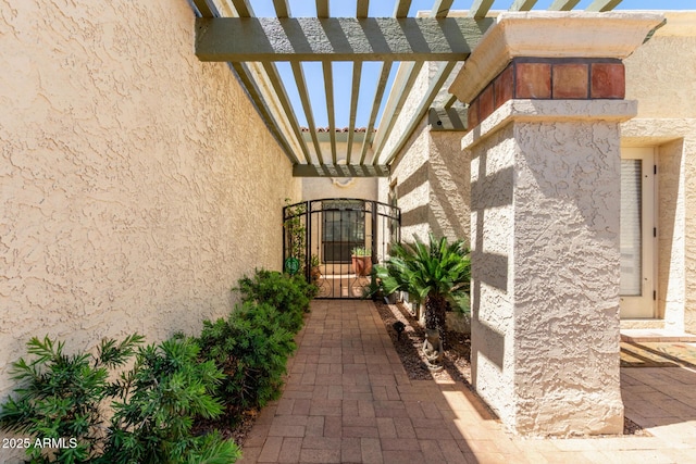 9012 S 47th Pl, Phoenix, AZ 85044 - entrance to property with a gate, a pergola, and stucco siding