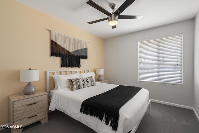 4904 E Tierra Buena Ln, Scottsdale, AZ 85254 - bedroom with dark colored carpet, baseboards, and ceiling fan