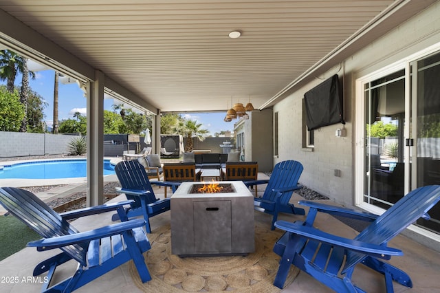 4904 E Tierra Buena Ln, Scottsdale, AZ 85254 - view of patio featuring a fenced in pool, a fire pit, and a fenced backyard