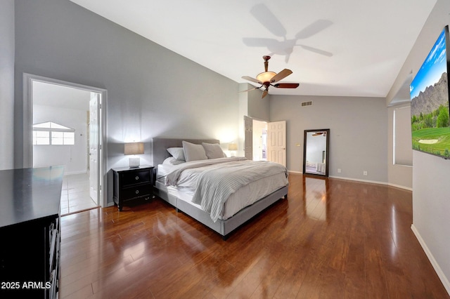 bedroom with lofted ceiling, ceiling fan, and hardwood / wood-style flooring