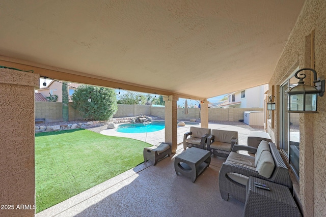 view of patio / terrace with a fenced in pool