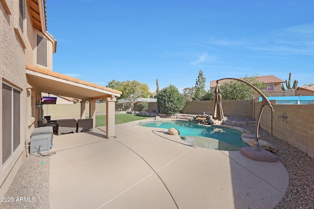 view of pool featuring a patio