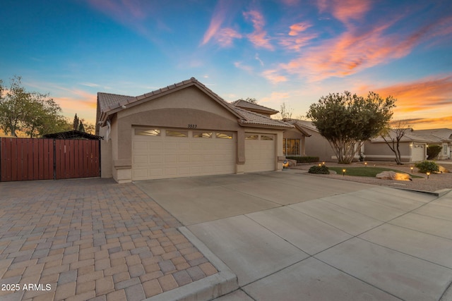 view of front of property featuring a garage