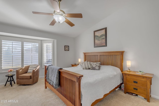 carpeted bedroom featuring ceiling fan and lofted ceiling