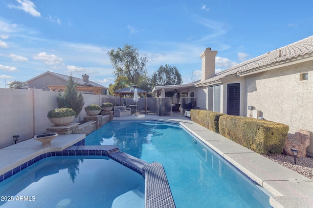 view of pool featuring a patio