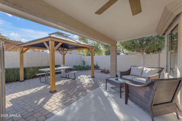 view of patio featuring a gazebo and an outdoor hangout area