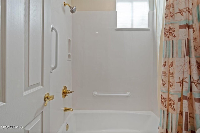 bathroom with shower / bath combo