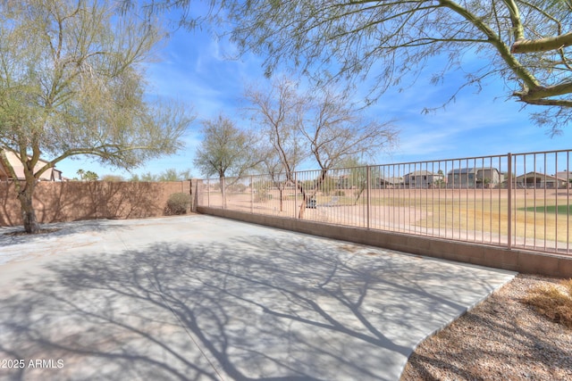 view of patio / terrace featuring fence